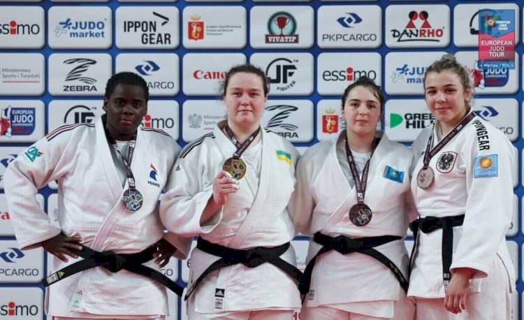 Қола медаль қоржында