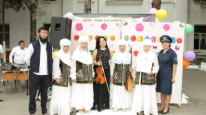 Алматы колониясындағы балалар мерекеде ата-анасымен кездесті