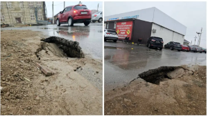 Атырауда нөсерден кейін жол опырылып түскен